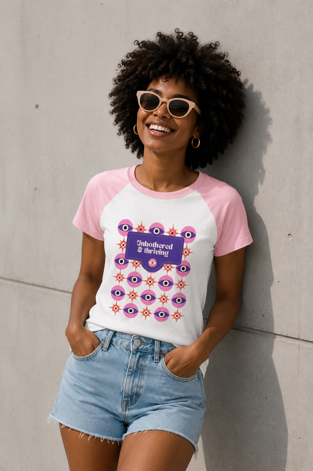 Tee | Unbothered & Thriving – Eyes Graphic Baby Tee